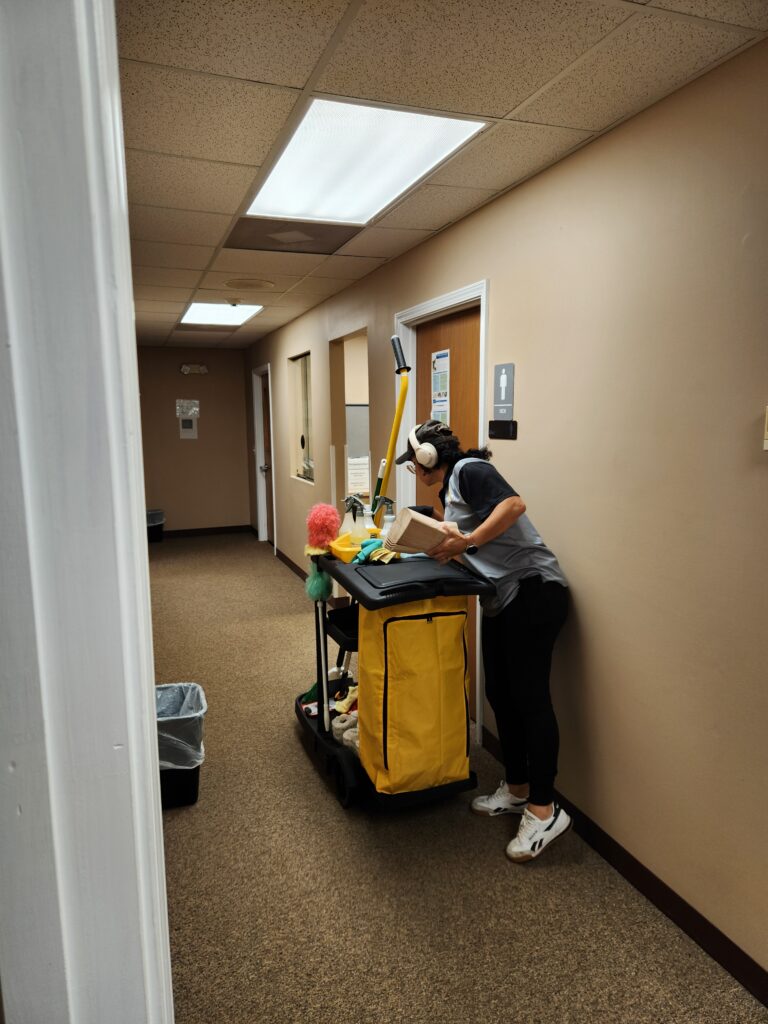 Janitor cleaning a government facility